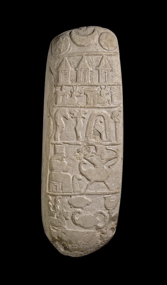 Boundary stone showing a lion-headed mace symbol associated with Nergal
