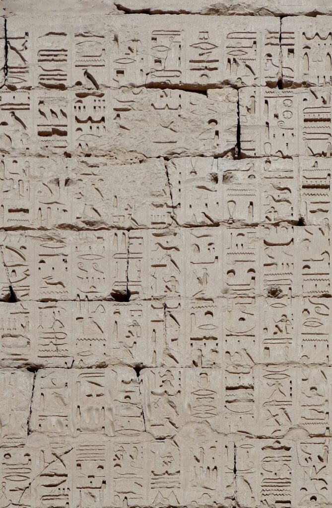 Relief scene at Medinet Habu depicting Ramesses III confronting seaborne enemies.