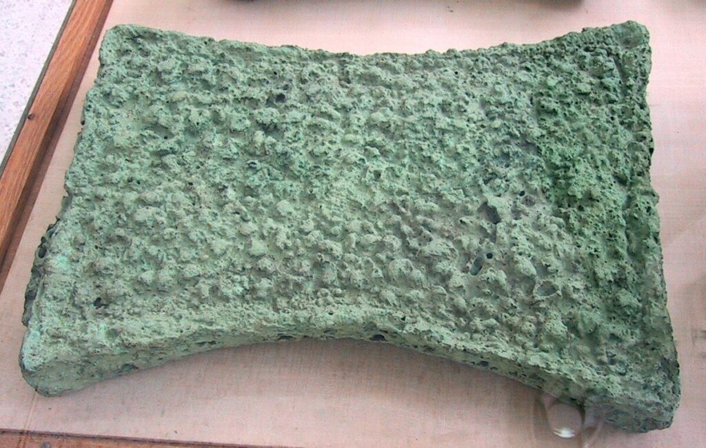Oxhide-shaped copper ingot from Zakros, Crete, typical of Late Bronze Age bulk copper.
