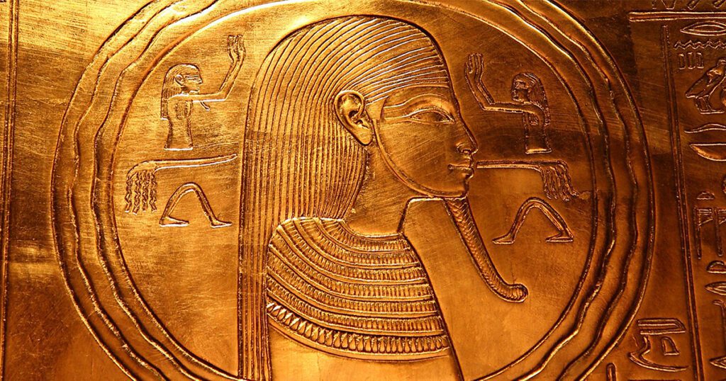 Detail from Tutankhamun's shrine showing Ra-Osiris encircled by serpents, early ouroboros and protective Mehen.