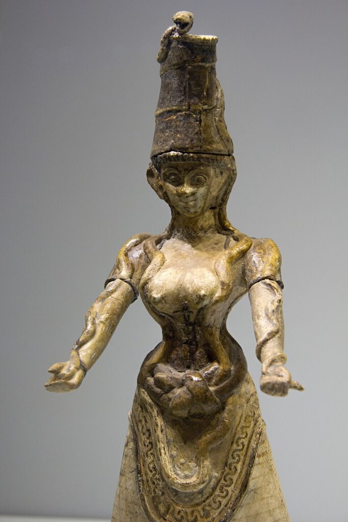 Minoan Snake Goddess figurine from Knossos holding serpents.