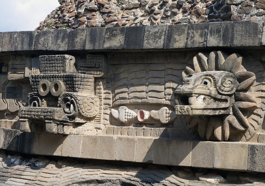 Plumed serpent head and undulating body at the Temple of the Feathered Serpent, Teotihuacan.