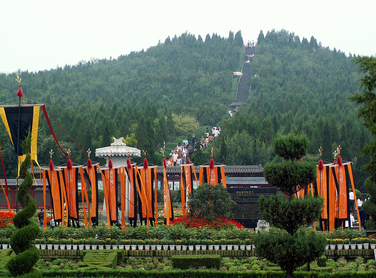 Earthen mound of the First Qin Emperor's mausoleum within its walled precinct near Xi'an.
