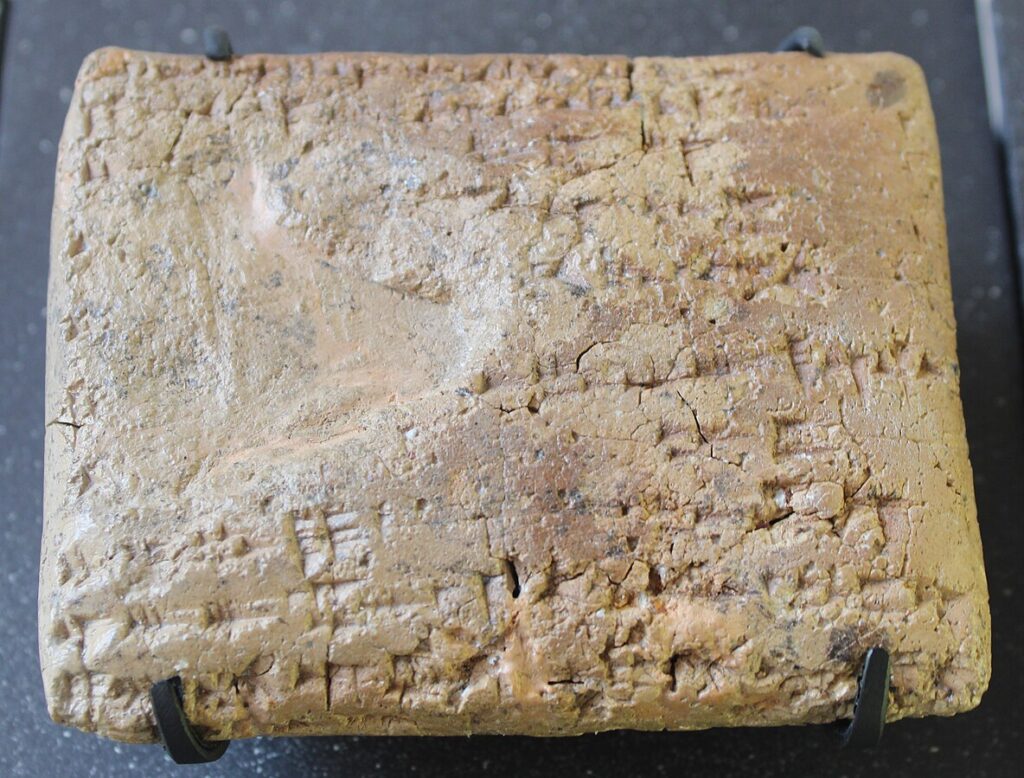 Ugaritic cuneiform tablet noting people from Cyprus receiving provisions at Ugarit.