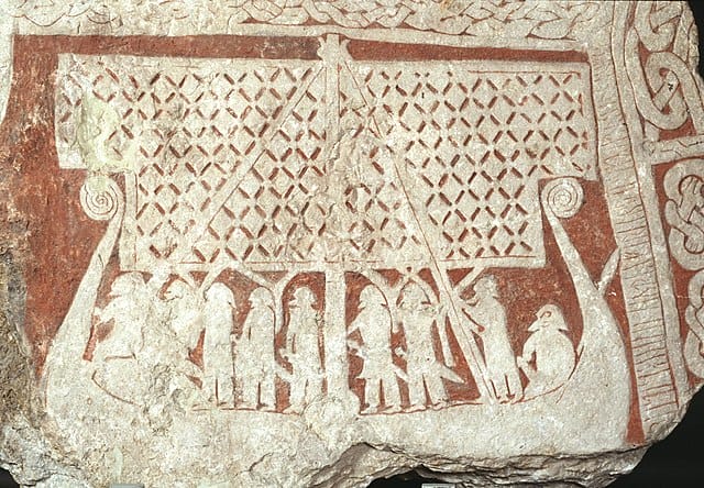 Viking Age picture stone with ship and warriors, linking myth, travel, and memory